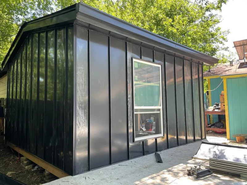 Black standing seam metal wall panels for Metal Roof Installation in Paw Paw