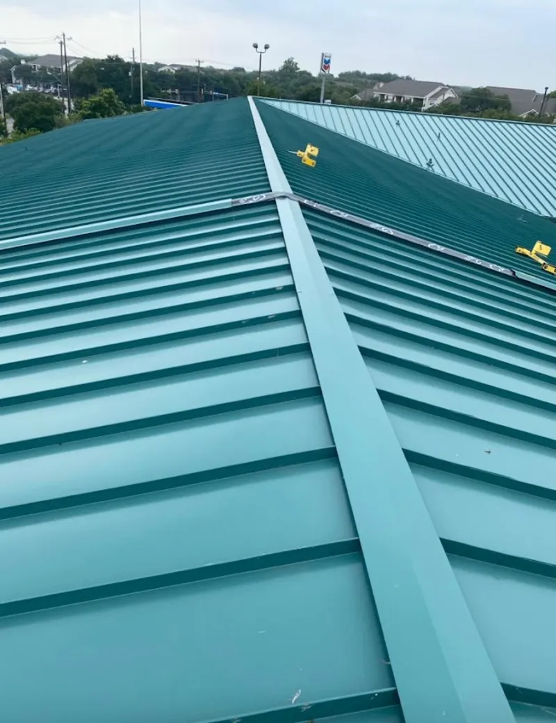 Green commercial metal roof ridge and valley for Metal Roof Repair in Paw Paw